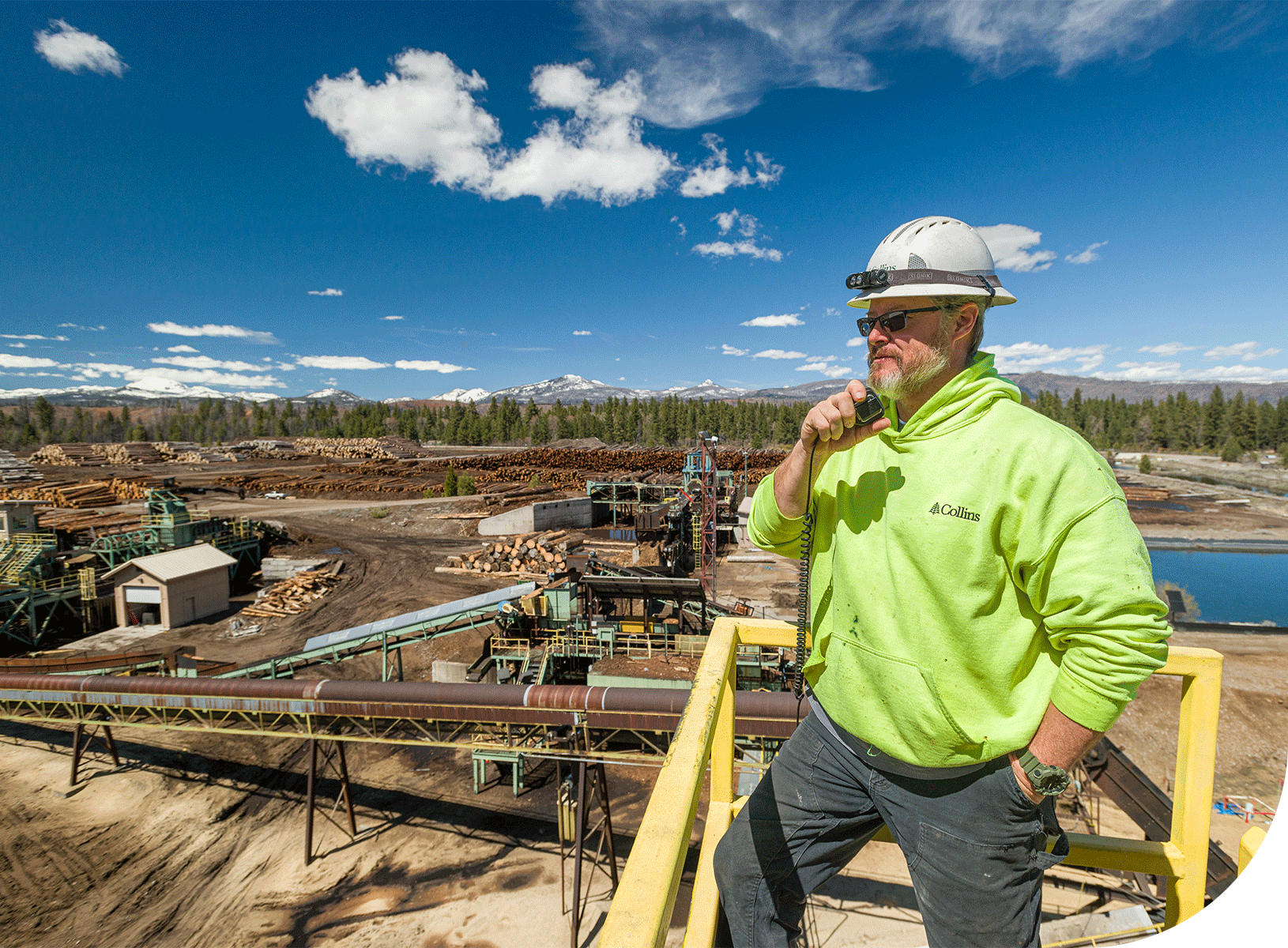 Collins facilities, wood product manufacturing, overlooking sawmill